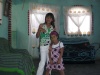 Alejandro González y su prima Nayeli Cuellar en una navidad (dic2008).