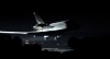 El Endeavour aterrizó por última vez en medio de la oscuridad en el mismo momento en que el Atlantis, el último transbordador que viajará al espacio, llegaba a la plataforma de lanzamiento para el gran despegue final dentro de cinco semanas.