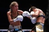 Anastasia  buscó estorbar al pegarse al cuerpo de la campeona.