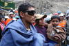 Los mineros, en aparente buen estado y con gafas de sol, y fueron recibidos por sus familiares, además de Humala.