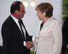 Hollande emprendió viaje a Berlín pocas horas después de tomar posesión de su cargo y fue recibido por la canciller alemana, Angela Merkel.