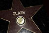 Slash, cuyo nombre verdadero es el de Saul Hudson, recibió en unas de sus siete nominaciones al Grammy americano por su interpretación del tema de “El padrino” y por el documental de Evans “The kids stays in the picture”.