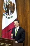 Peña Nieto dijo que tendrá una presidencia "abierta a la crítica" y anunció reformas para crear una Comisión Nacional Anticorrupción, aumentar la transparencia en estados y municipios y regular la compra de publicidad gubernamental.