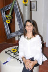 14092012 EXPOSICIóN.  Lourdes Castil, participó con un diseño en reciente exposición floral.