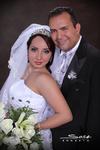 Lic. Claudia Irene  Romo Serda el día de su boda con el Lic. Jorge Alberto López Vie - Studio E. Sosa