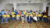Integrantes  de Mentes con Alas en la subasta organizada por el Club Rotario.