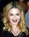 Madonna se sumó a la tendencia conocida como ‘Grillzz” al colocarse una placa de oro y diamantes en los dientes como ya lo han hecho estrellas como Rihanna y Justin Bieber.