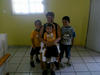Lilia Guadalupe Estrada con sus nietos Kael, Roberto y Santiago.