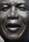 En 1952, Mandela abrió con su correligionario Oliver Tambo el primer bufete de abogados negros de Sudáfrica, a la vez que se inició en las primeras protestas contra el "apartheid", régimen de segregación racial instaurado por la minoría blanca en 1949. Luego, cada vez más entregado a la lucha antirracista, en 1956 fue acusado de alta traición por un supuesto intento de golpe de Estado.