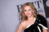 Kylie Minogue llegó al lado de su hermana Dannii a la ceremonia.