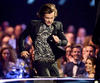 Distintos memes han circulado por las redes sociales con montajes de la foto en la que Harry aparece corriendo apresurado a recoger el premio junto a su compañeros de la banda.