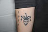 En las fotografías de los tatuajes se puede observar el rostro de Cristo, la corona de rey, una clave de sol, una flor, un pájaro, un tigre, el escudo de su equipo de hockey, un salmo y la palabra "Belive".