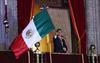 Ondeando la Bandera Mexicana, el mandatario lanzó vivas a los héroes de la independencia mexicana, tras lo cual repitió tres veces el tradicional Grito de "¡Viva México!", entre aplausos de los asistentes.