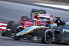 Kimi Raikkonen, el otro piloto de Ferrari, salía desde el lugar 11 pero luego daría una excelsa exhibición de conducción para concluir en cuarto del GP de Malasia.