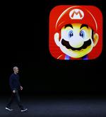 El consejero delegado de Apple, Tim Cook, dio la bienvenida a Miyamoto al escenario del auditorio Bill Graham de San Francisco para que presentar el nuevo juego, que representa la primera vez que Nintendo se asocia con Apple para la distribución de uno de sus juegos.