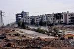 Soldados sirios preparándose para atacar en enfrentamiento de Alepo.