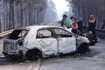 Muchas de las víctimas murieron atrapadas en sus autos cuando las llamas invadieron una carretera.