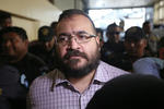 El otrora mandatario de Veracruz escuchó a los funcionarios de Guatemala cuando leían su estado civil, su nacionalidad y hasta el regaño que el juez Saúl Martínez impuso a los periodistas por hablar durante el proceso.