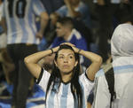 Argentina fans stand in disblief in the stands after their team played Peru to a 0-0 draw, after a World Cup qualifying soccer match at La Bombonera stadium in Buenos Aires, Argentina, Thursday, Oct. 5, 2017. The draw left Argentina with little possibility to make it to the World Cup in Russia.(AP Photo/Victor R. Caivano)