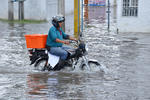 26 de septiembre. Lluvias | Diversos sectores de la ciudad amanecieron convertidos en una laguna después del aguacero que se dejó sentir.