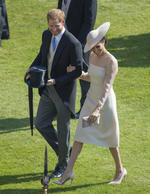 Meghan en su llegada al evento real en el Palacio de Buckingham.