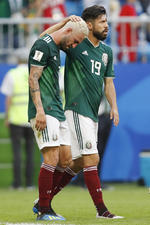Los jugadores mexicanos sumergidos en la derrota.