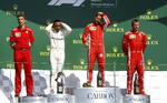 Kimi Raikkonen, coequipero de Vettel, cerró el podio.