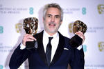 El director mexicano Alfonso Cuarón ganó como Mejor Director y Mejor Película.