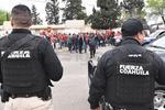 Cerca de 20 patrullas con 180 elementos de las policías municipales de Nueva Rosita y Fuerza Coahuila, custodiaron la marcha.