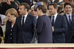 El presidente francés, Emmanuel Macron; la canciller alemana, Angela Merkel, y el primer ministro canadiense, Justin Trudeau.