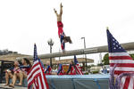 Fourth of July

Gymnasts from Gionastics Gymnastics take turns balancing on a balance beam Thursday, July 4, 2019, as their float moves down Elizabeth Street during the Brownsville Herald 's 19th annual Salute to Freedom Fourth of July parade in Brownsville, Texas. (Denise Cathey/The Brownsville Herald via AP)