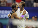 US Open Tennis

Daniil Medvedev, of Russia, congratulates Rafael Nadal, of Spain, after Nadal won the men's singles final of the U.S. Open tennis championships Sunday, Sept. 8, 2019, in New York. (AP Photo/Charles Krupa)