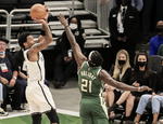 Bucks resisten embate de Nets en triunfo