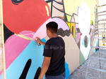 Artistas urbanos pintan murales en la Antigua Harinera, edificio de Torreón