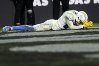 Los Angeles Chargers wide receiver Mike Williams (81) reacts after missing an attempted touchdown catch against the Las Vegas Raiders during overtime of an NFL football game, Sunday, Jan. 9, 2022, in Las Vegas. (AP Photo/David Becker)