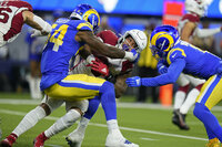 Odell Beckham Jr. y Cooper Kupp capturaron pases de touchdown para los Rams (13-5), campeones de la División Oeste de la Conferencia Nacional