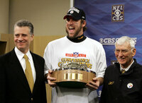 FILE - Pittsburgh Steelers quarterback Ben Roethlisberger, center, holds the AFC Championship trophy with Steelers president Art Rooney III, left, and Chairman Dan Rooney after Pittsburgh advanced to Super Bowl XL with a 34-17 win over the Denver Broncos Sunday, Jan. 22, 2006, in Denver. Ben Roethlisberger's NFL career is over. The longtime Pittsburgh Steelers quarterback announced his retirement on Thursday, Jan. 27, 2022, saying it was “time to clean out my locker, hang up my cleats” after 18 years, two Super Bowls, countless team records and a spot in the Hall of Fame all but secure. (AP Photo/Gene J. Puskar, File)