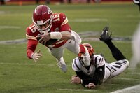 Cincinnati Bengals kicker Evan McPherson (2) celebrates after kicking a 52-yard field goal during the second half of the AFC championship NFL football game against the Kansas City Chiefs, Sunday, Jan. 30, 2022, in Kansas City, Mo. (AP Photo/Charlie Riedel)