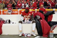 Kansas City Chiefs middle linebacker Willie Gay Jr. (50) sits on the bench at the end of the AFC championship NFL football game against the Cincinnati Bengals, Sunday, Jan. 30, 2022, in Kansas City, Mo. The Bengals won 27-24 in overtime. (AP Photo/Ed Zurga)