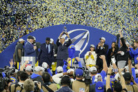 Los Angeles Rams' Matthew Stafford, right, and Jalen Ramsey celebrate after the NFC Championship NFL football game against the San Francisco 49ers Sunday, Jan. 30, 2022, in Inglewood, Calif. The Rams won 20-17 to advance to the Super Bowl. (AP Photo/Marcio Jose Sanchez)