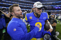 Los Angeles Rams' Matthew Stafford, right, and Jalen Ramsey celebrate after the NFC Championship NFL football game against the San Francisco 49ers Sunday, Jan. 30, 2022, in Inglewood, Calif. The Rams won 20-17 to advance to the Super Bowl. (AP Photo/Marcio Jose Sanchez)