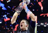 FILE - New England Patriots owner Robert Kraft, left, embraces quarterback Tom Brady after defeating the Jacksonville Jaguars in the AFC championship NFL football game, Sunday, Jan. 21, 2018, in Foxborough, Mass. The Patriots won 24-20. Tom Brady has retired after winning seven Super Bowls and setting numerous passing records in an unprecedented 22-year-career. He made the announcement, Tuesday, Feb. 1, 2022, in a long post on Instagram. (AP Photo/Winslow Townson, File)