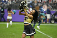 A Dallas Cowboys cheerleader performs during the second half of the Pro Bowl NFL football game between the AFC and the NFC, Sunday, Feb. 6, 2022, in Las Vegas. The AFC won 41-35. (AP Photo/Rick Scuteri)