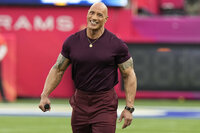 Dwayne 'The Rock' Johnson smiles before the NFL Super Bowl 56 football game between the Los Angeles Rams and the Cincinnati Bengals, Sunday, Feb. 13, 2022, in Inglewood, Calif. (AP Photo/Chris O'Meara)