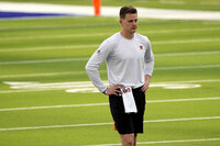 Cincinnati Bengals tight end C.J. Uzomah warms up before the NFL Super Bowl 56 football game against the Los Angeles Rams, Sunday, Feb. 13, 2022, in Inglewood, Calif. (AP Photo/Marcio Jose Sanchez)