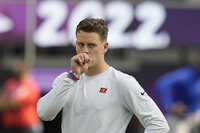 Cincinnati Bengals quarterback Joe Burrow warms up before the NFL Super Bowl 56 football game against the Los Angeles Rams, Sunday, Feb. 13, 2022, in Inglewood, Calif. (AP Photo/Chris O'Meara)