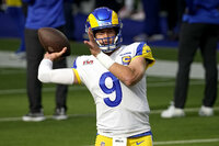 Cincinnati Bengals quarterback Joe Burrow warms up before the NFL Super Bowl 56 football game against the Los Angeles Rams, Sunday, Feb. 13, 2022, in Inglewood, Calif. (AP Photo/Chris O'Meara)