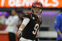 Los Angeles Rams quarterback Matthew Stafford (9) warms up before the NFL Super Bowl 56 football game between the Los Angeles Rams and the Cincinnati Bengals, Sunday, Feb. 13, 2022, in Inglewood, Calif. (AP Photo/Tony Gutierrez)