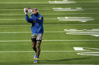 Los Angeles Rams wide receiver Cooper Kupp warms up before the NFL Super Bowl 56 football game Cincinnati Bengals, Sunday, Feb. 13, 2022, in Inglewood, Calif. (AP Photo/Lynne Sladky)