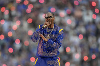 Dr. Dre, left, and Snoop Dogg perform during halftime of the NFL Super Bowl 56 football game between the Los Angeles Rams and the Cincinnati Bengals Sunday, Feb. 13, 2022, in Inglewood, Calif. (AP Photo/Marcio Jose Sanchez)